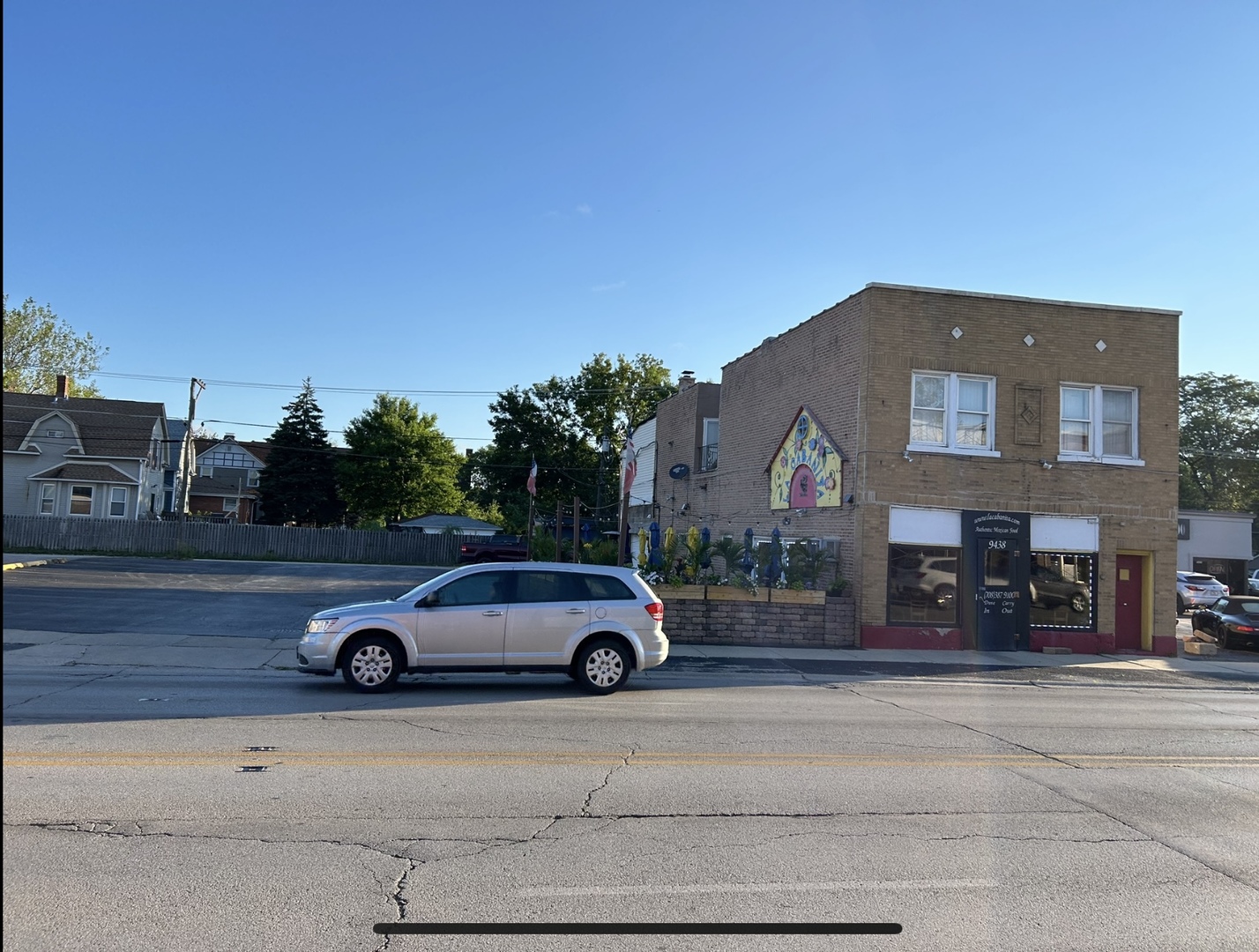 a car parked in front of a house