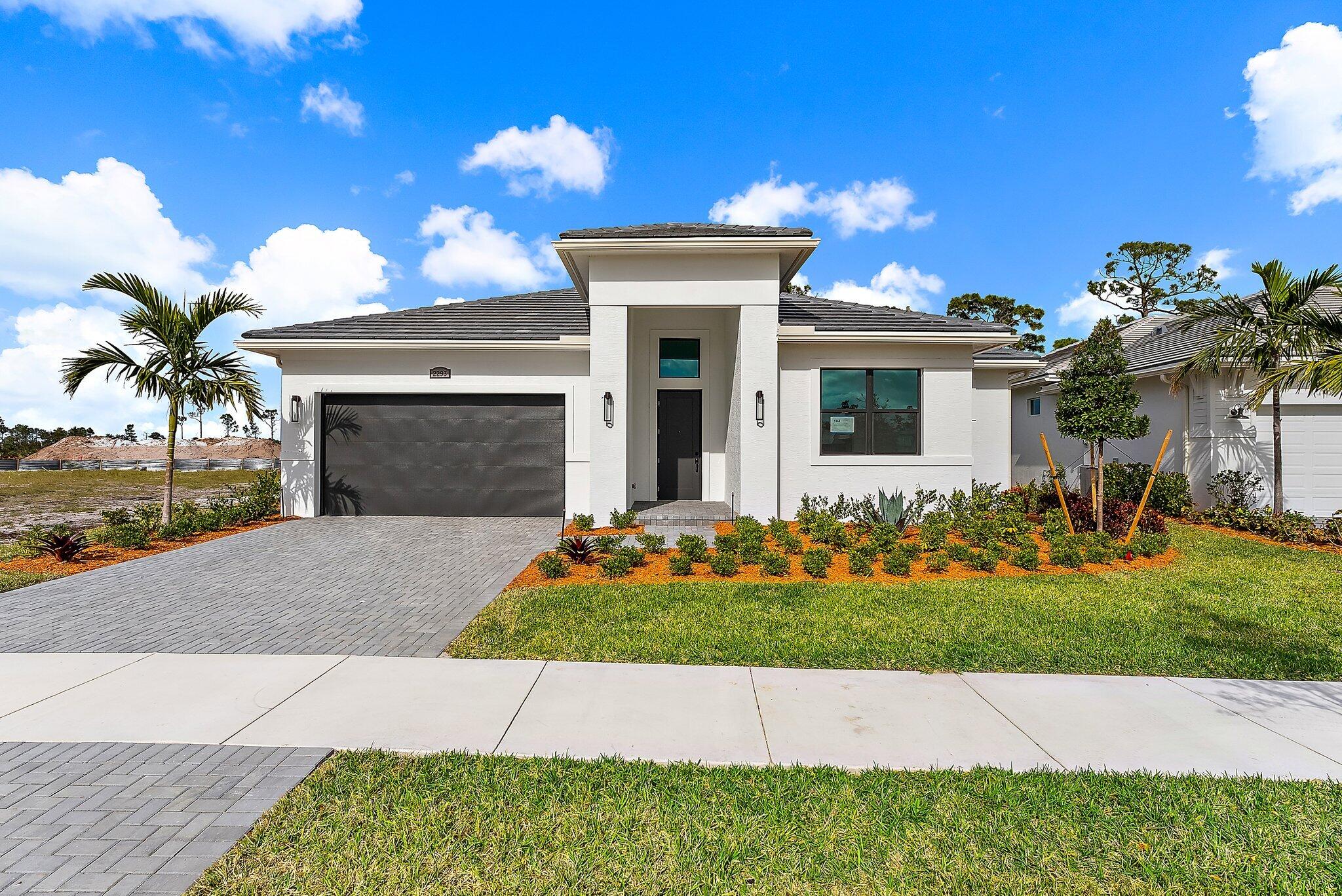 a view of front a house with a yard