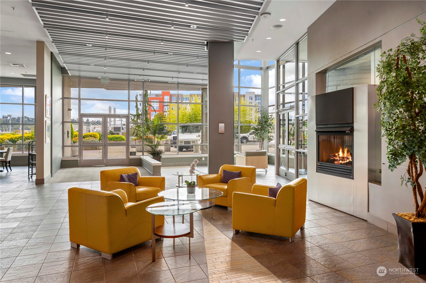 a living room with furniture and a flat screen tv