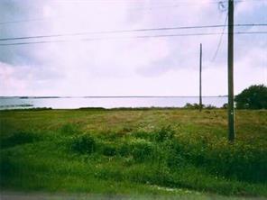 a view of a field with grass