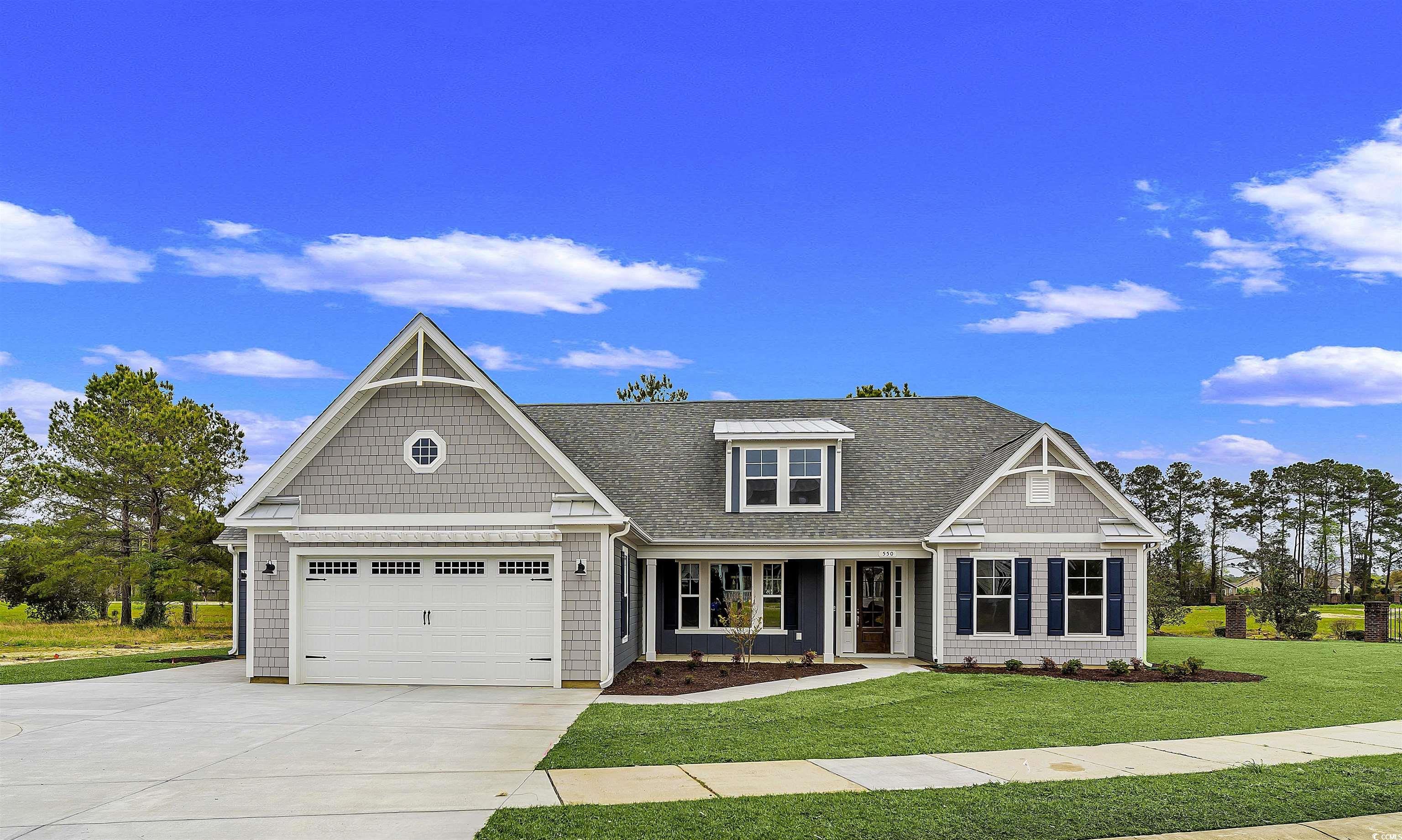 Craftsman-style home featuring a front lawn, a por