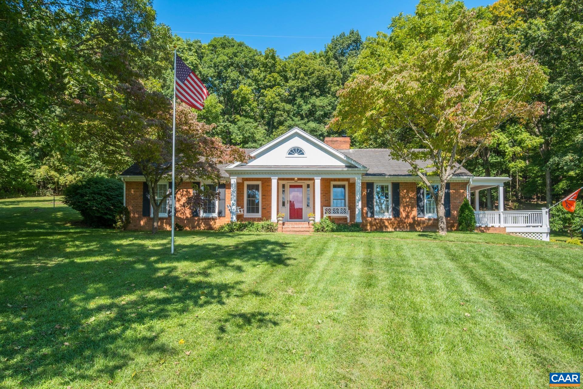 a front of a house with a garden