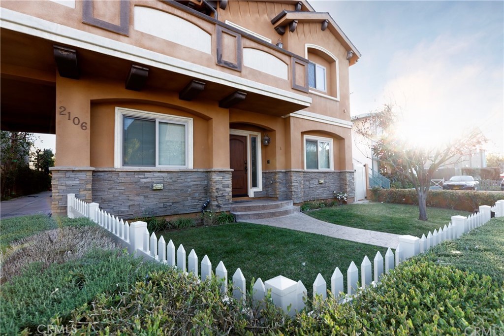 front view of house with a yard