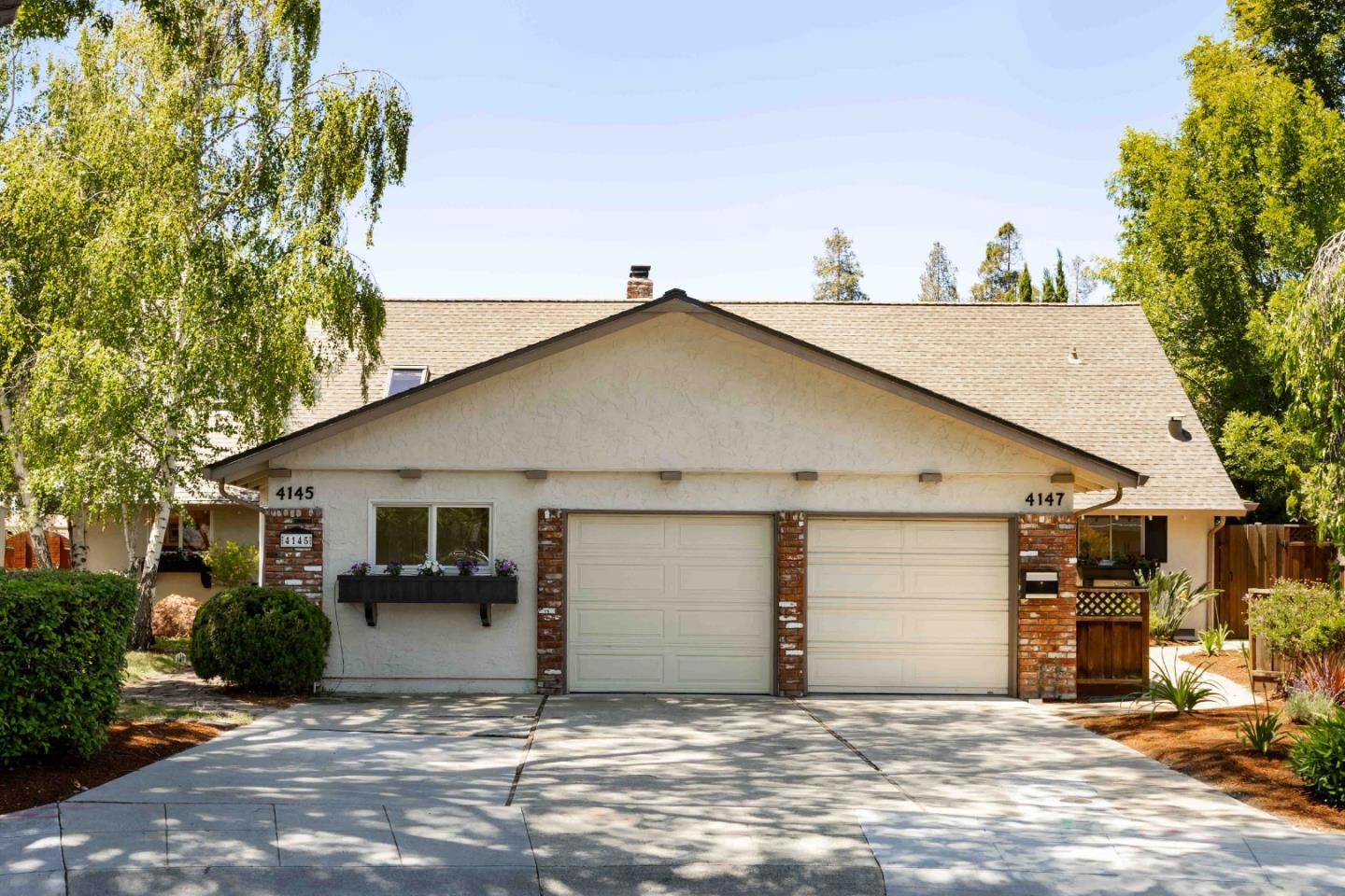 a view of a house with a garage