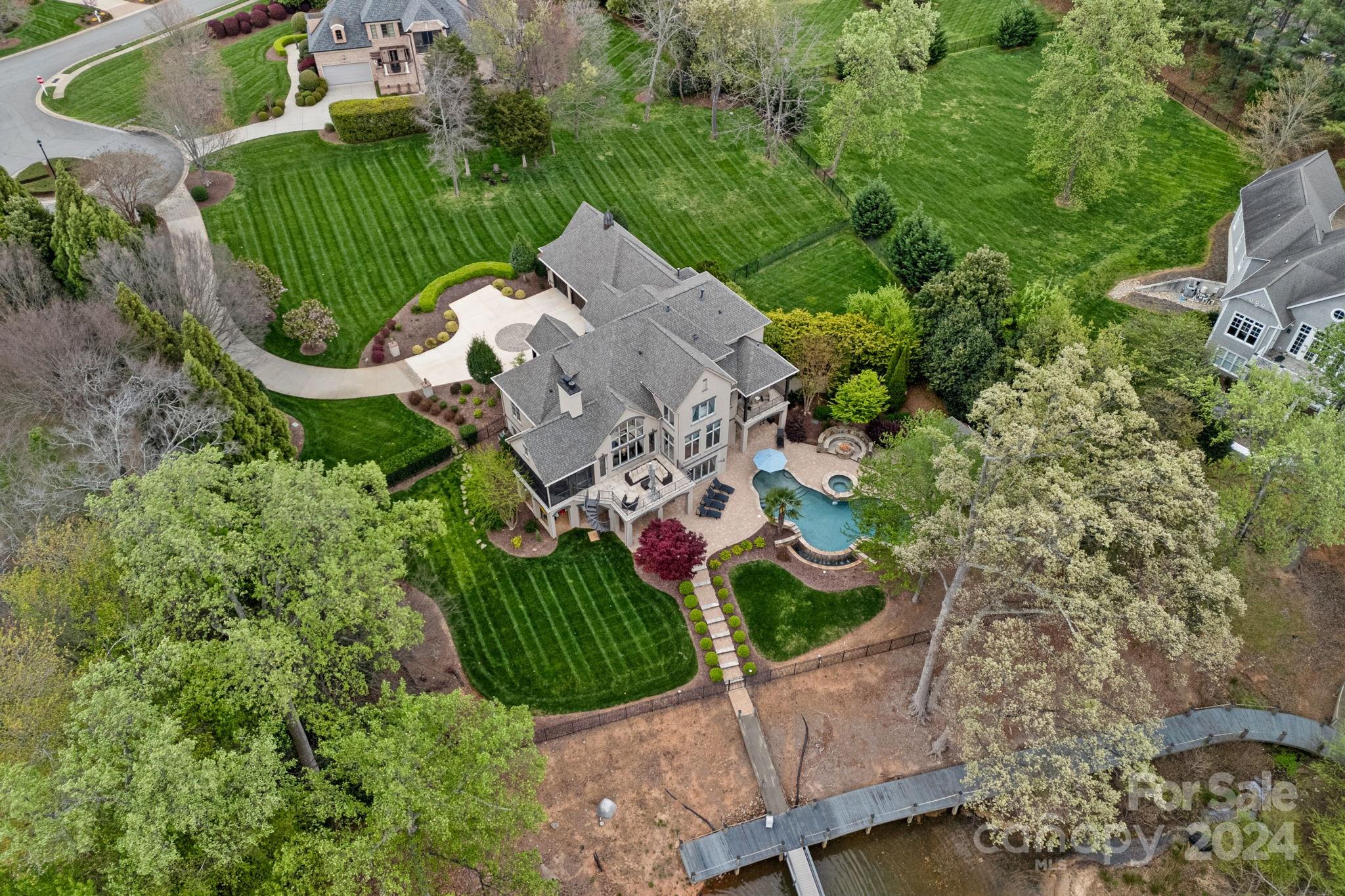 an aerial view of a house with a garden