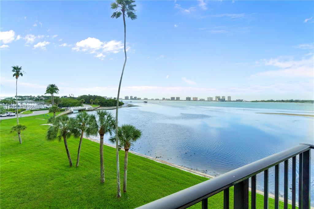 a view of a lake from a balcony