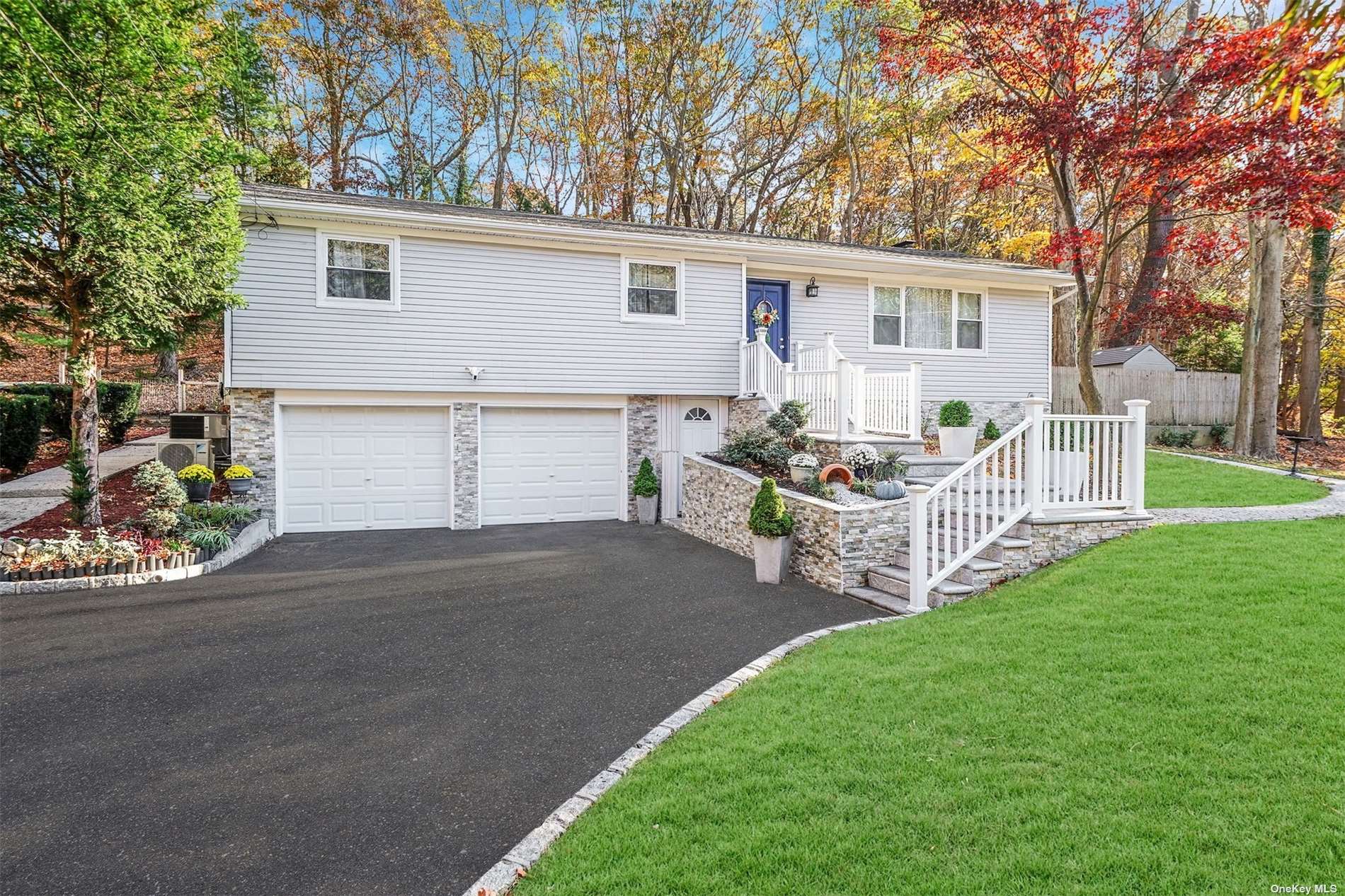 a front view of house with yard and seating area