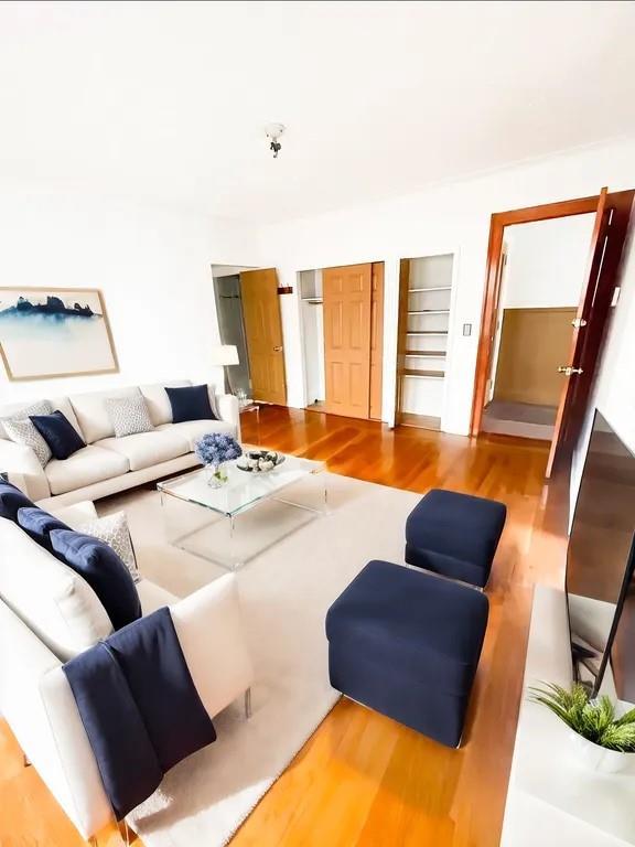 Living room featuring light hardwood / wood-style flooring