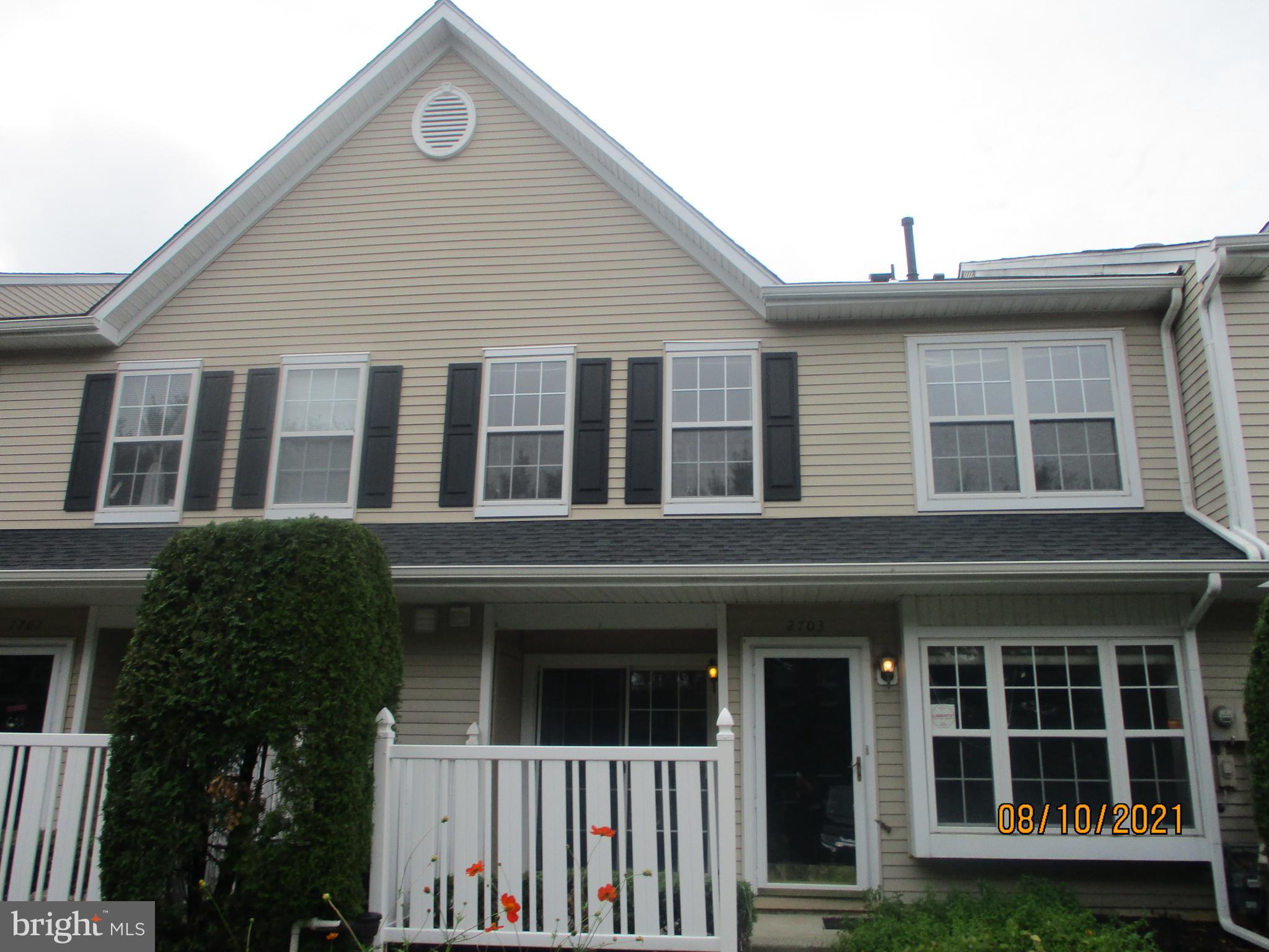 a front view of a house with windows