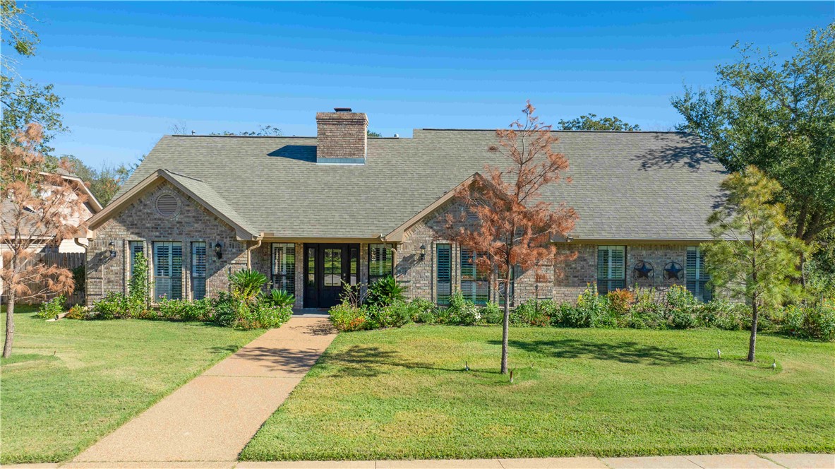 View of front of house with a front lawn