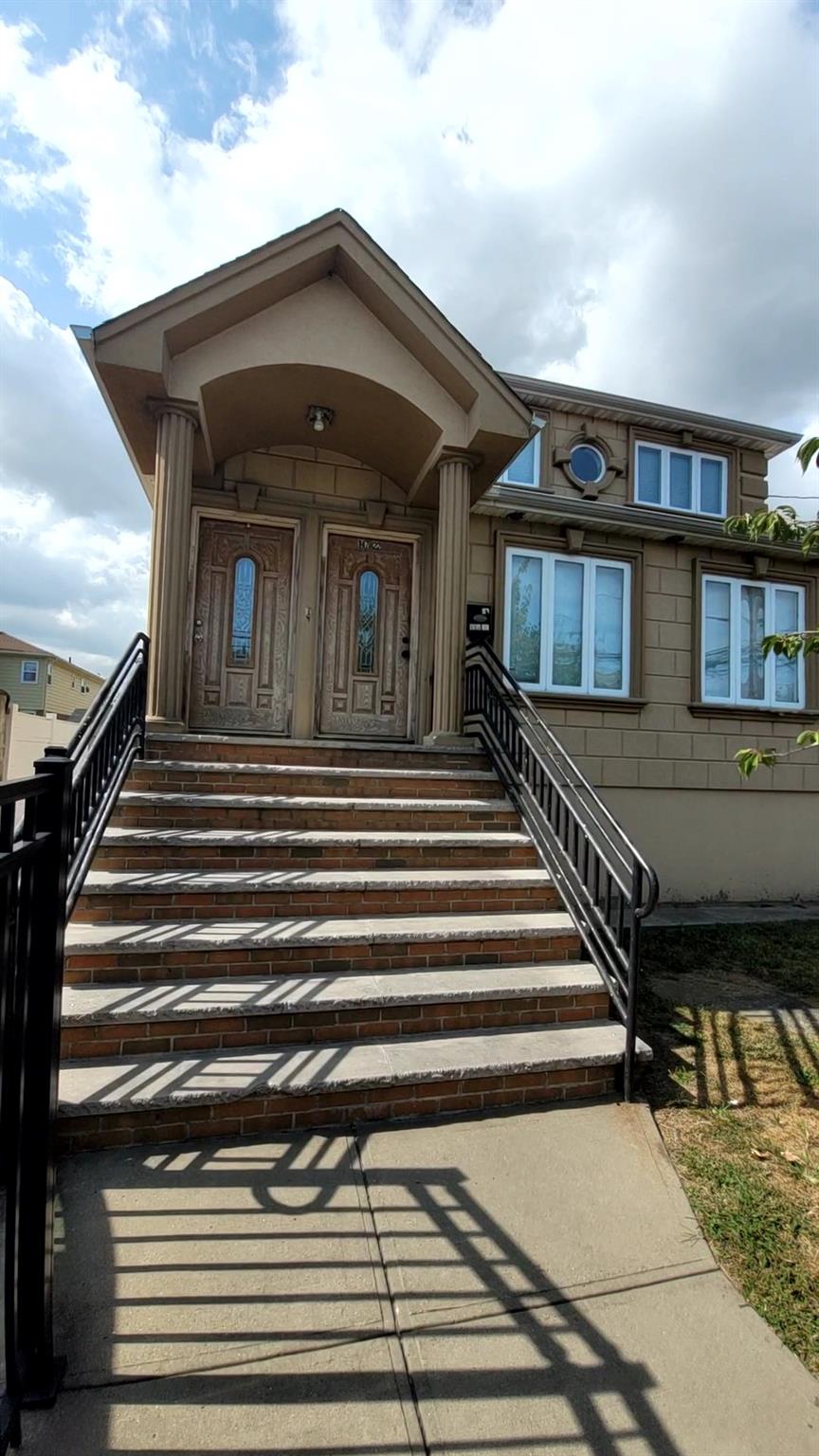 a front view of a house with a balcony