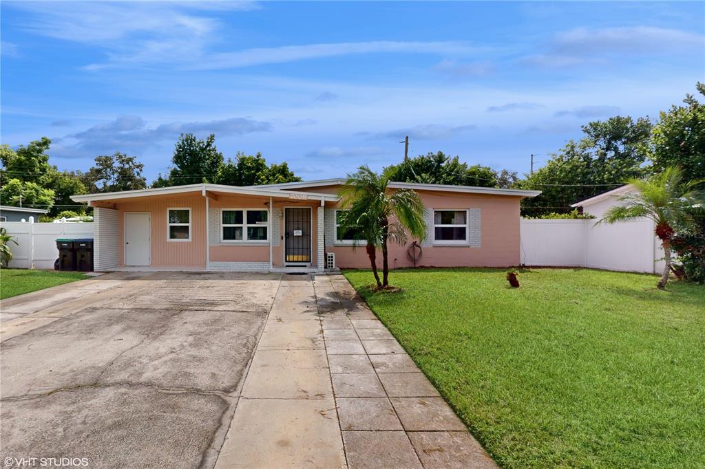 front view of a house with a yard