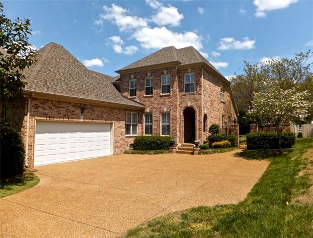 Wow!  All brick home with good curb appeal-beautiful magnolia tree - private fenced level back yard with Brentwood address