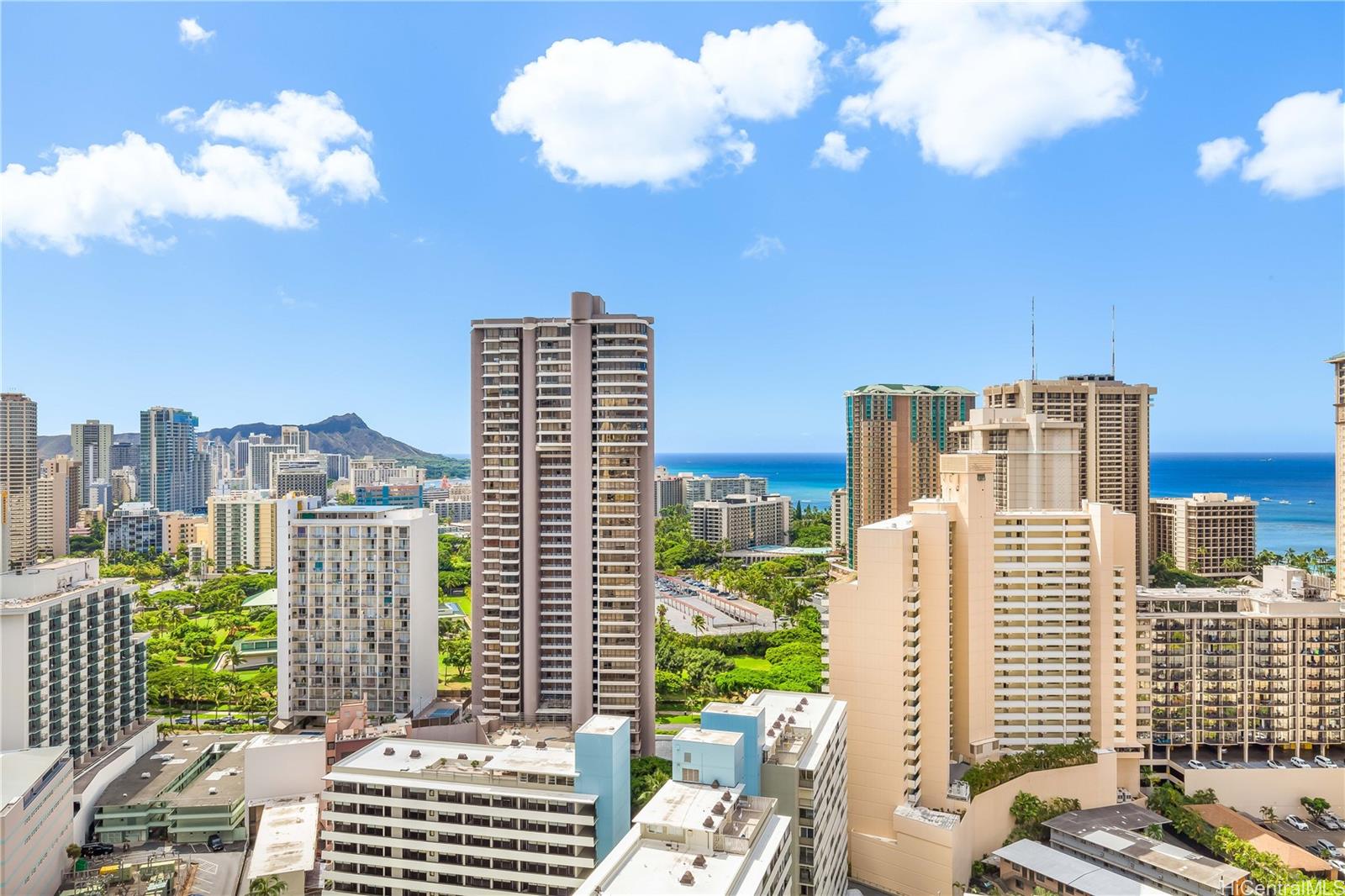 a view of a city with tall buildings