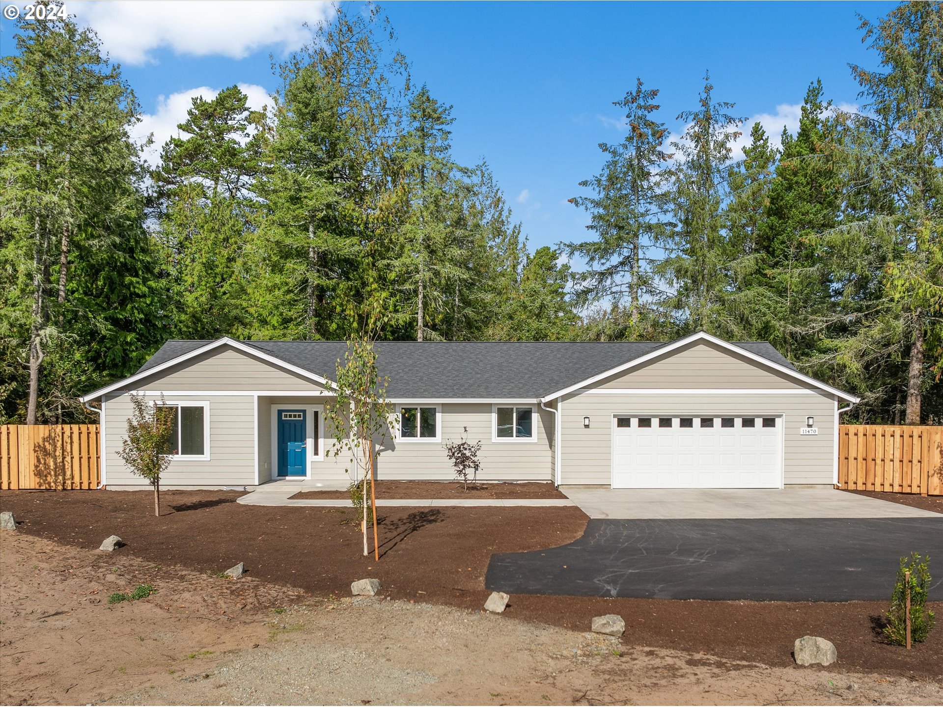 a view of front of house with a yard