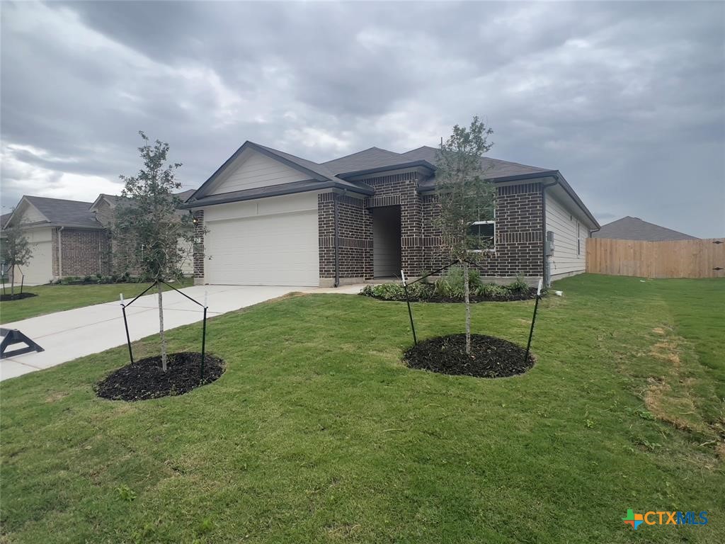 a house view with a garden space