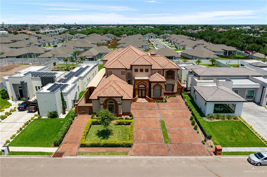 an aerial view of a house with a garden