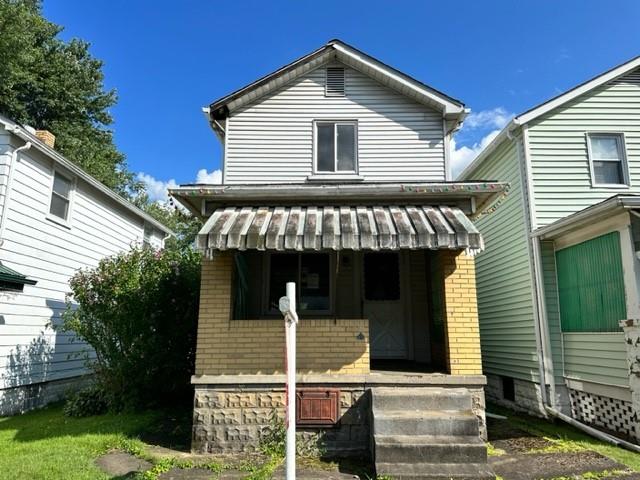 a front view of a house with garage