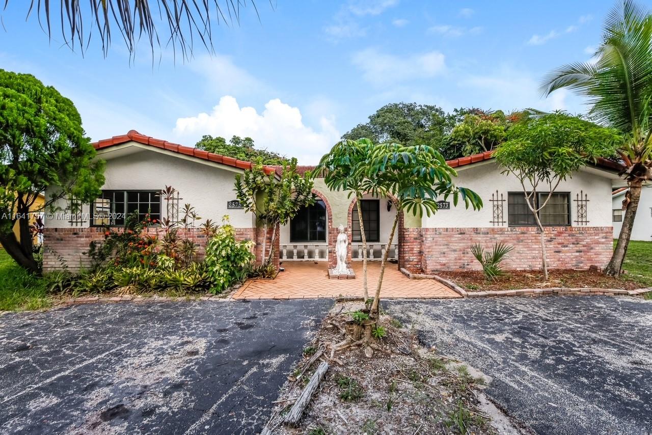 a view of a house with a patio