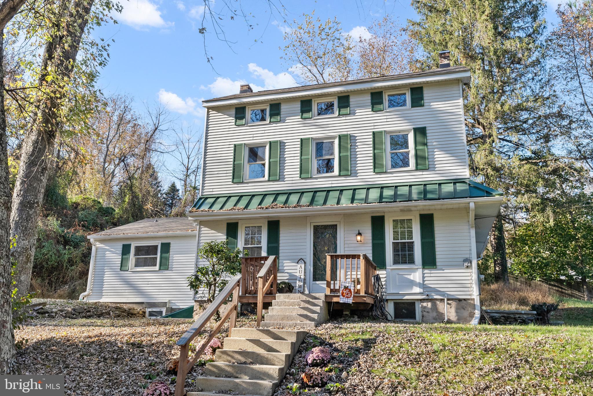 a front view of a house with patio