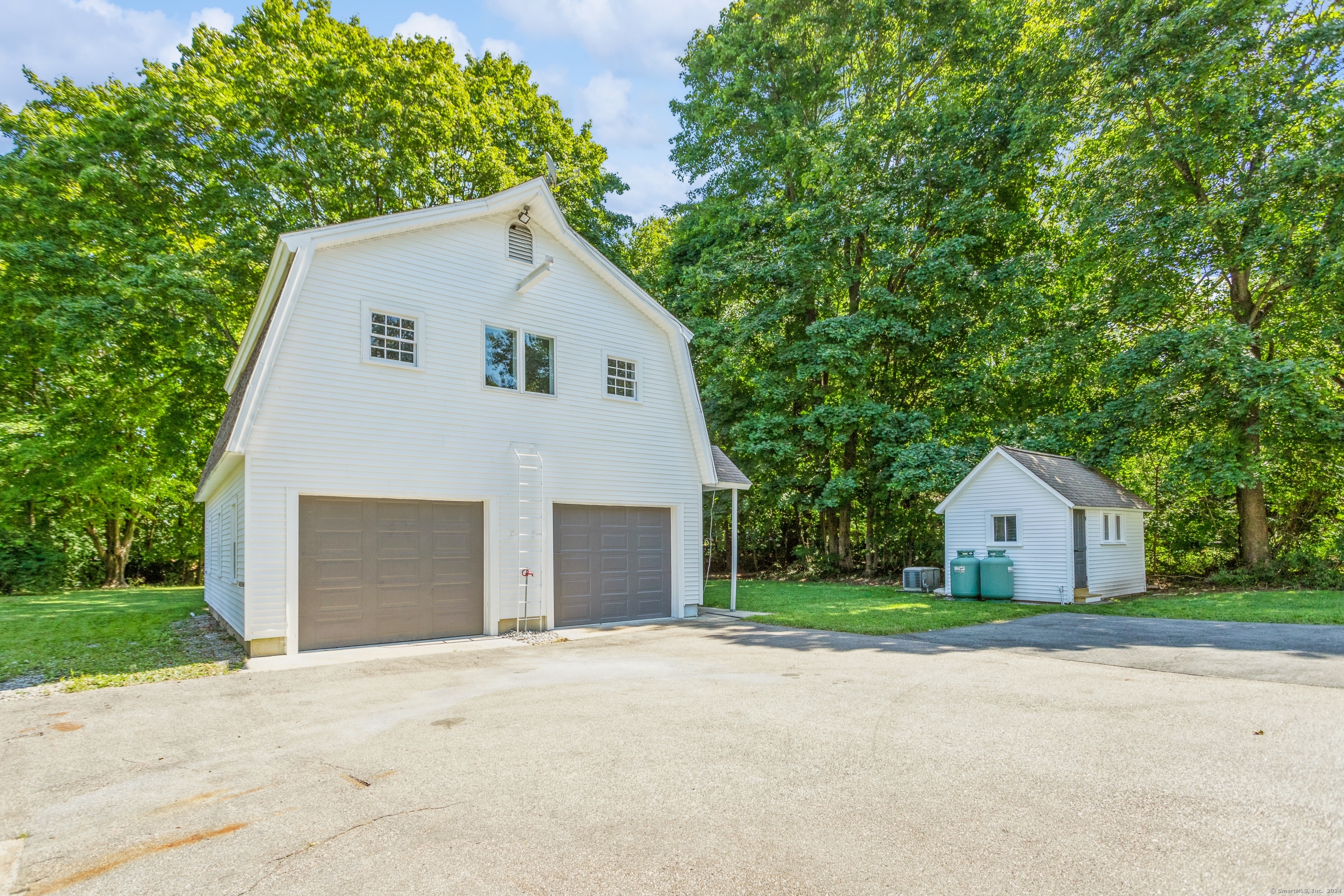 Huge detached heated garage with finished loft