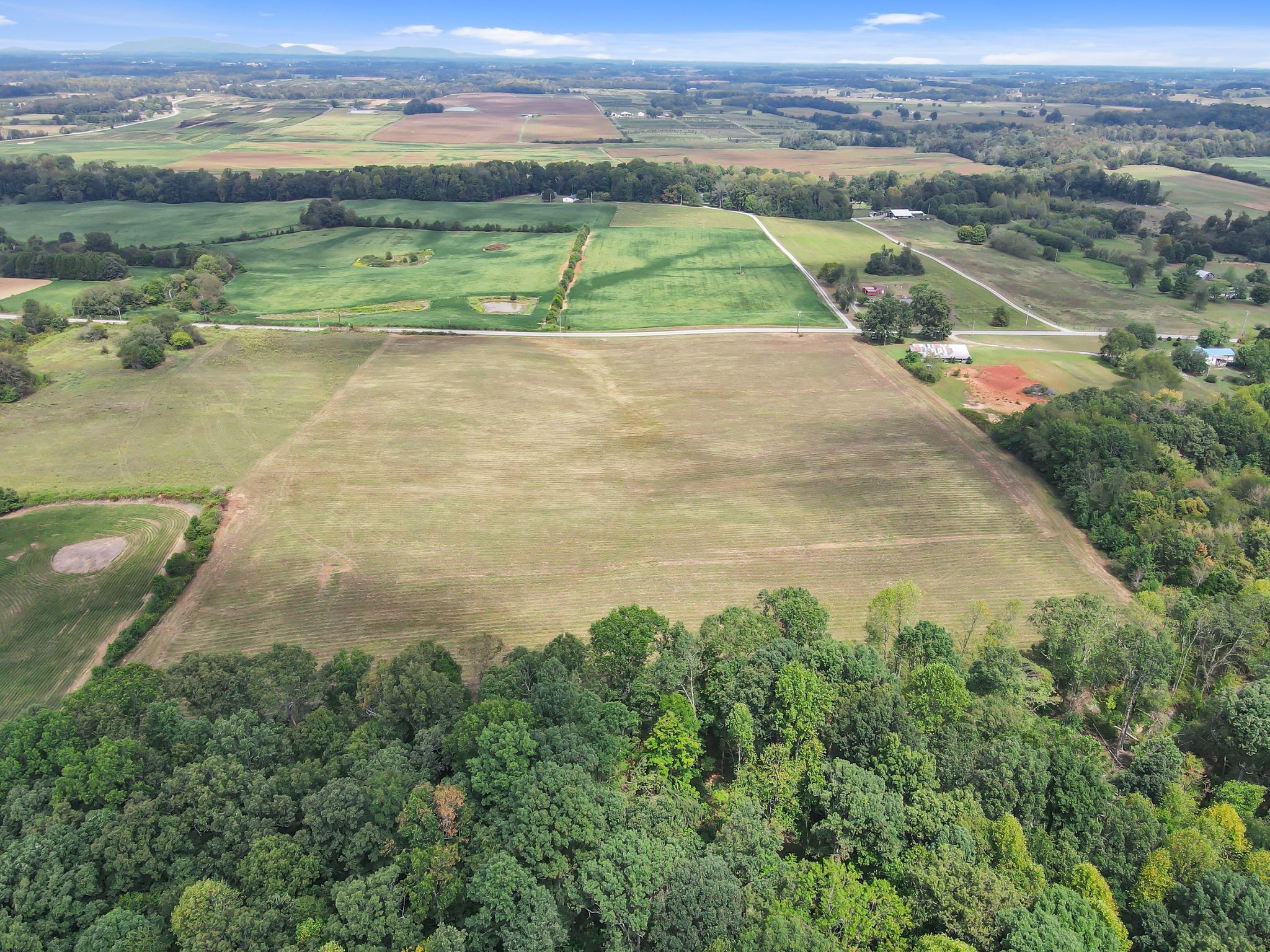 an aerial view of a houses with outdoor space