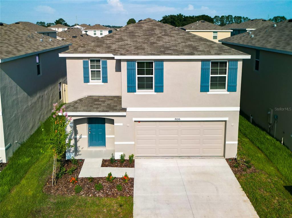 front view of house with a yard