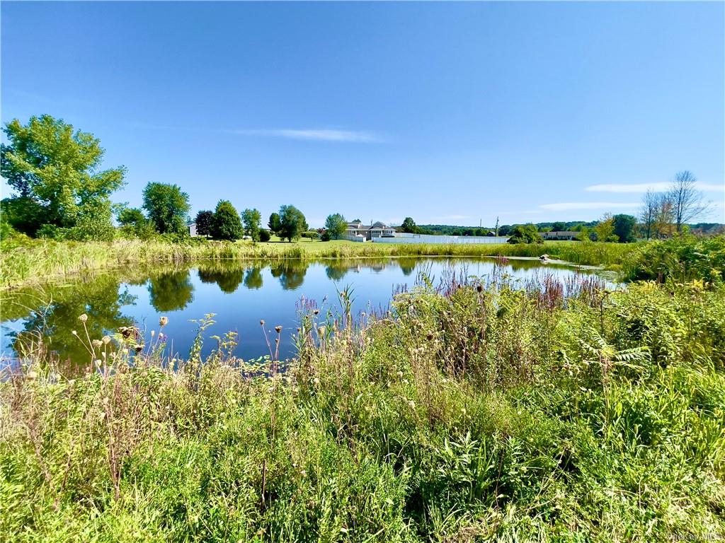 a view of a lake with outdoor space