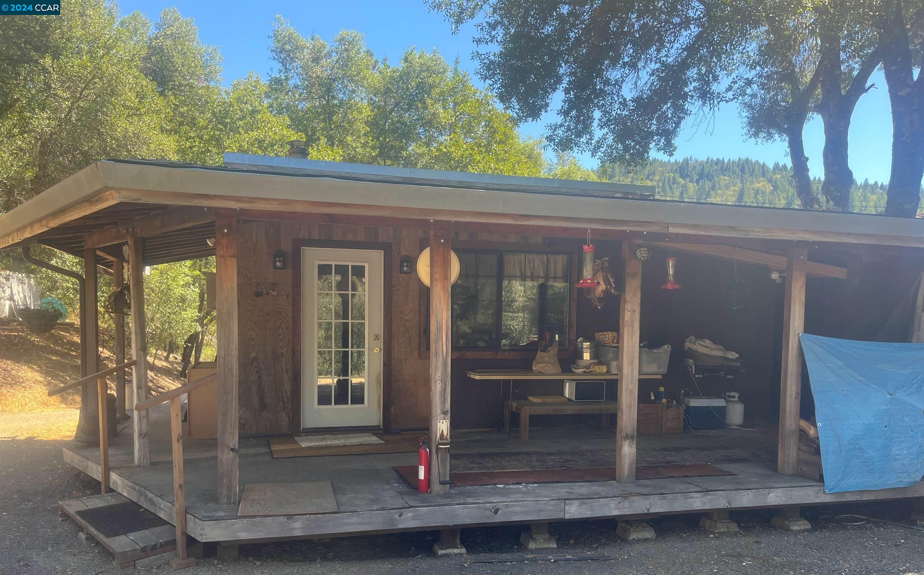 a view of a porch with a door