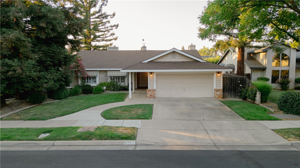 front view of house with a yard