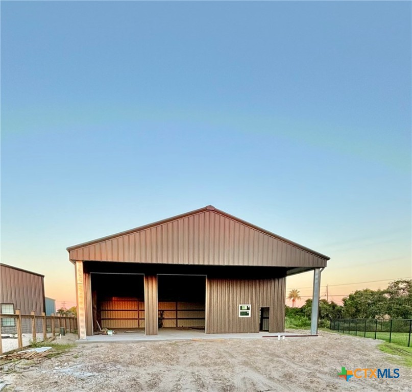 a front view of a house with garage