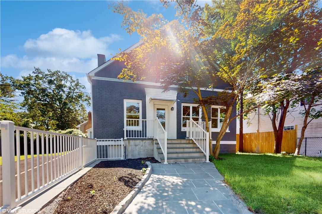 front view of a house with a yard