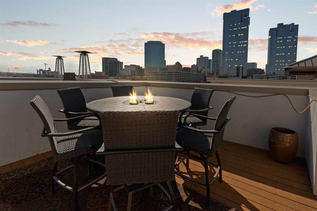 a view of a terrace with sitting area