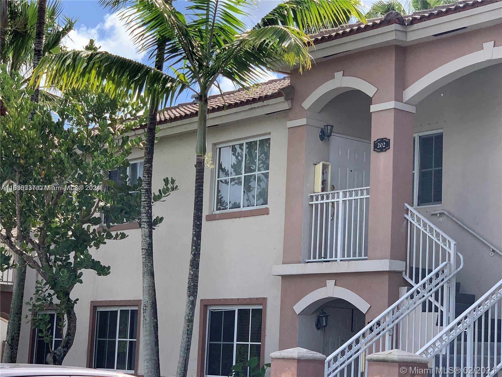 a front view of a house with balcony