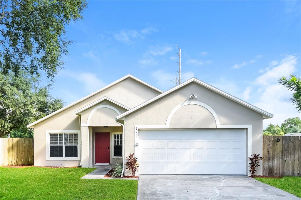 front view of a house with a yard