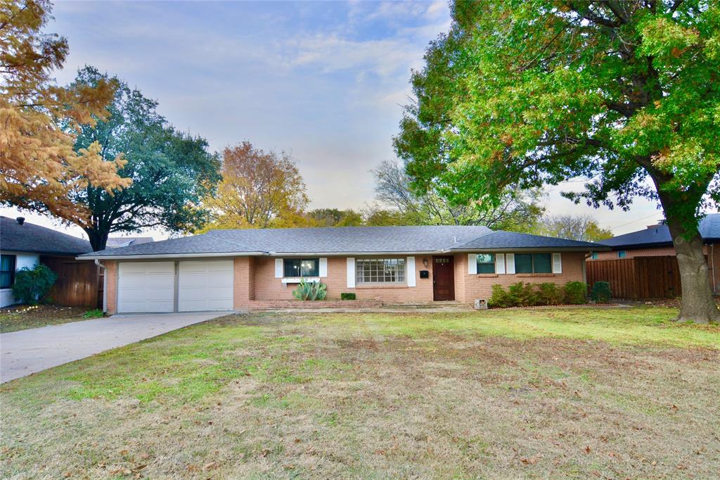 front view of house with a yard