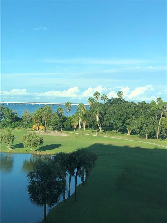 a view of a golf course with a lake