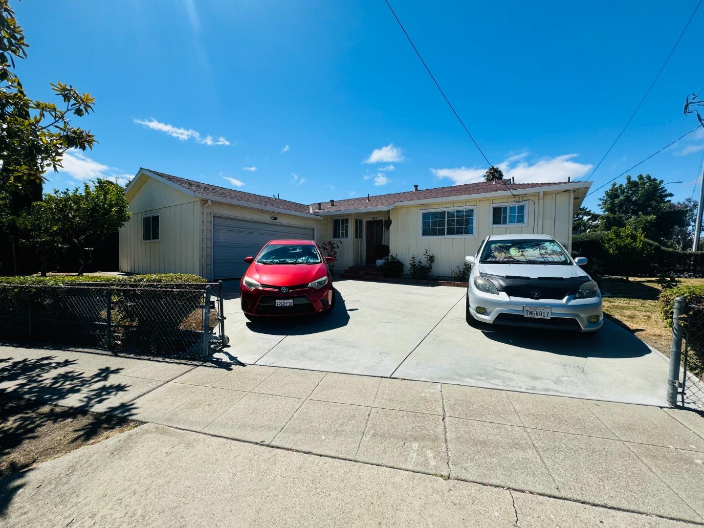 a car parked in front of a house