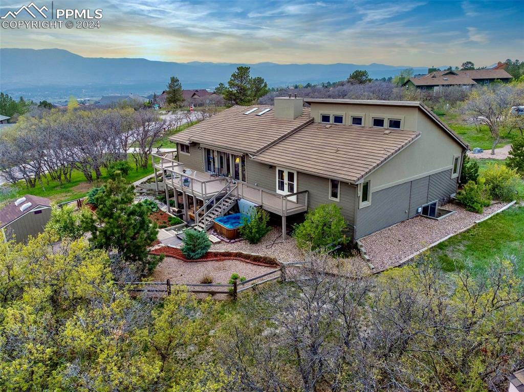 an aerial view of a house with a garden