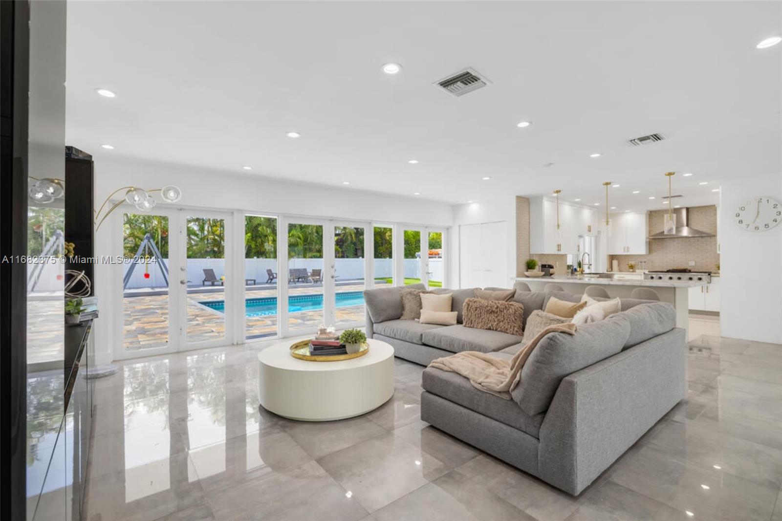 a living room with furniture and a table