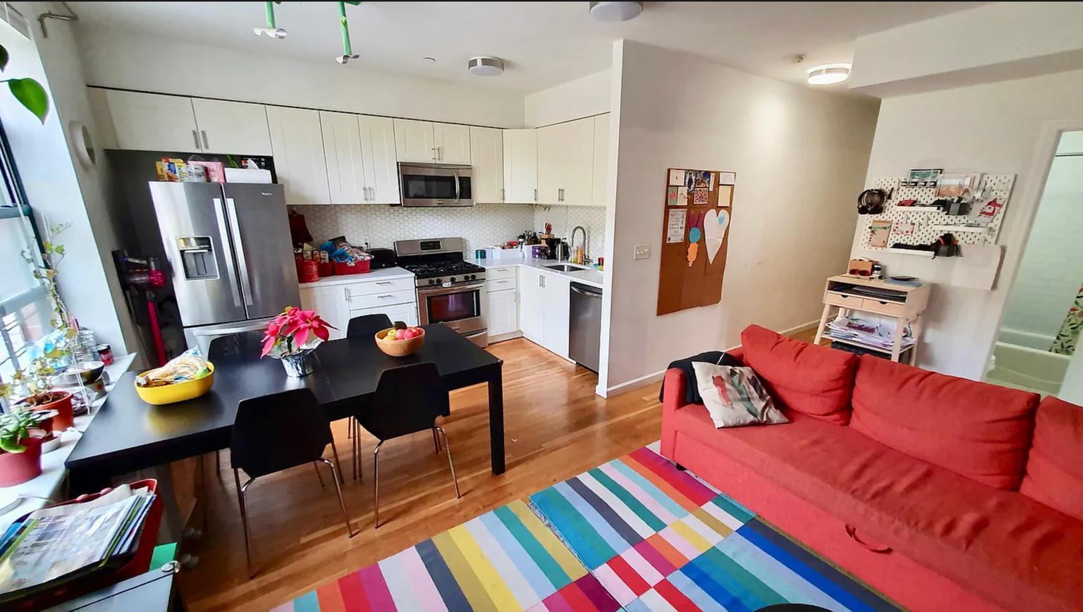 a living room with furniture fireplace and a flat screen tv