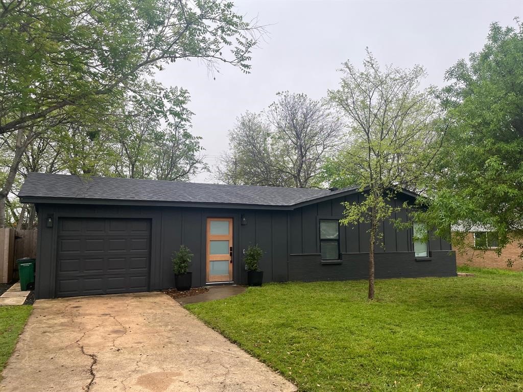 a house with trees in front of it