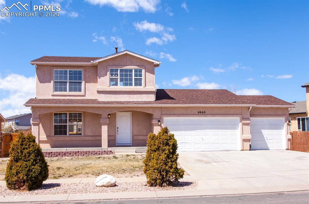 Front facade featuring a garage