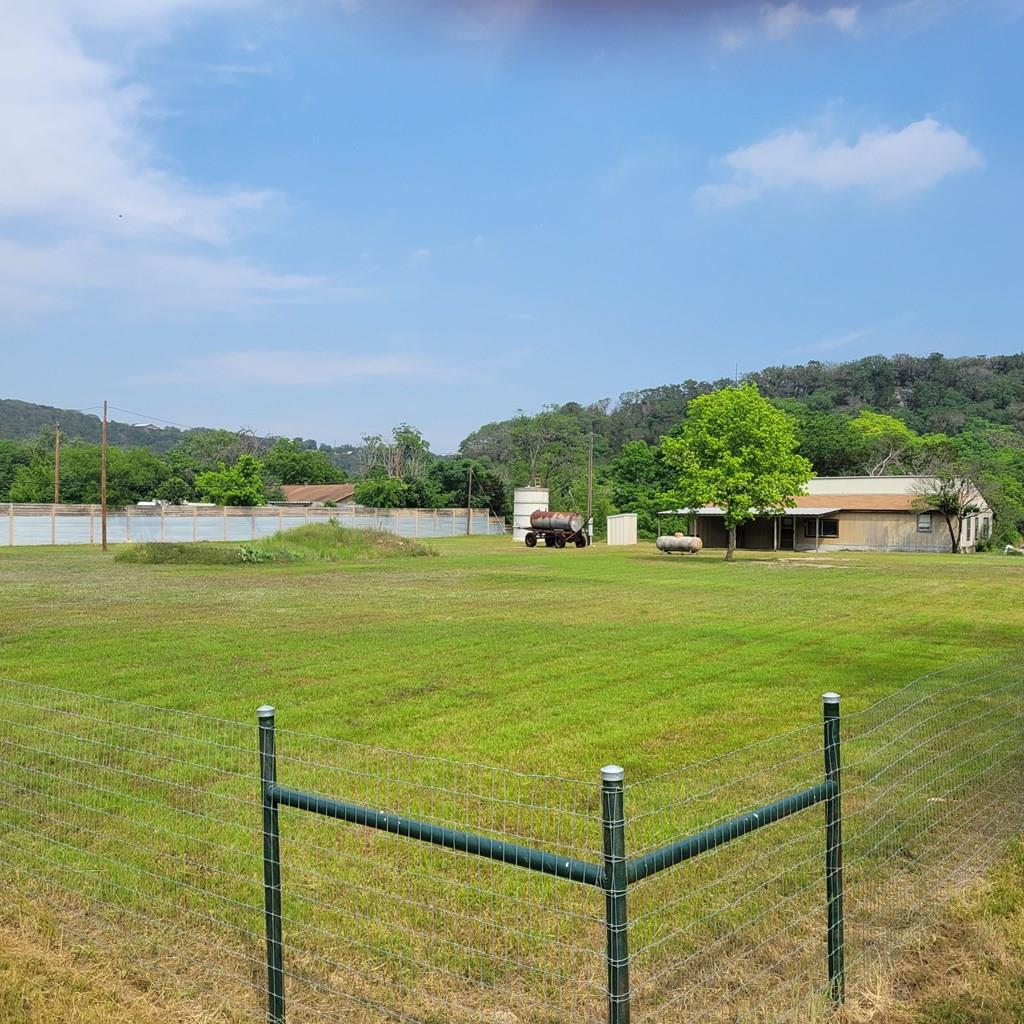 a view of a lake with a big yard