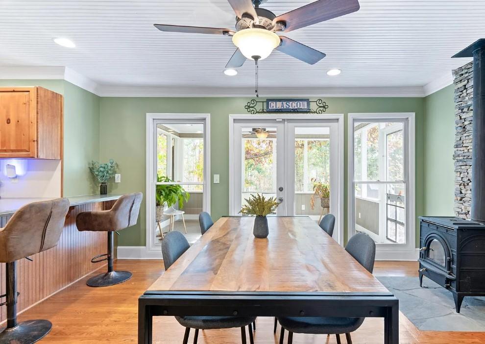 a living room with furniture a window and a chandelier