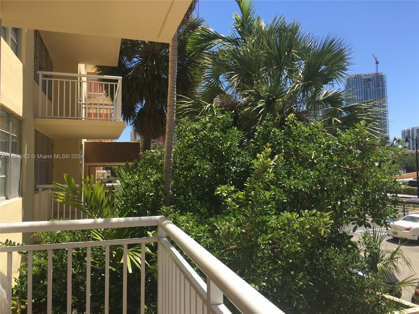 a balcony with an outdoor space