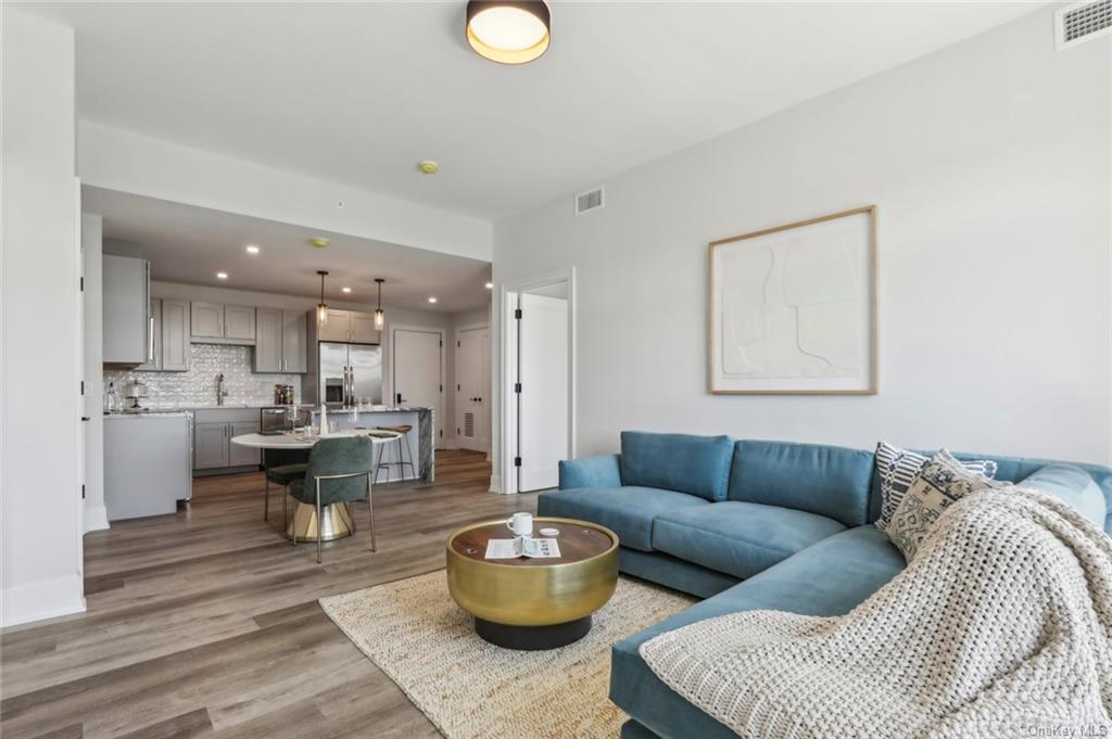 a living room with furniture and a couch