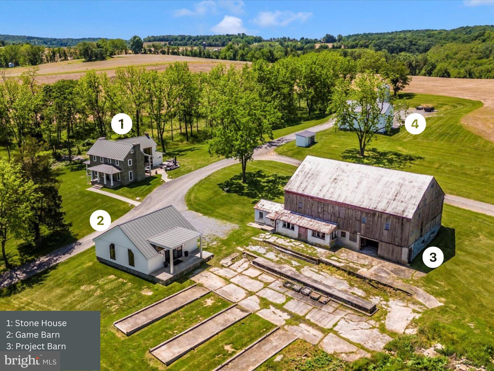 an aerial view of a house with garden space and outdoor space