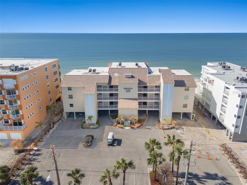 an aerial view of a building with entryway