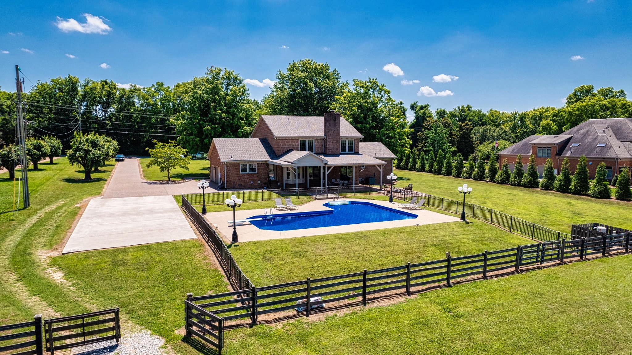 a view of a swimming pool with a patio